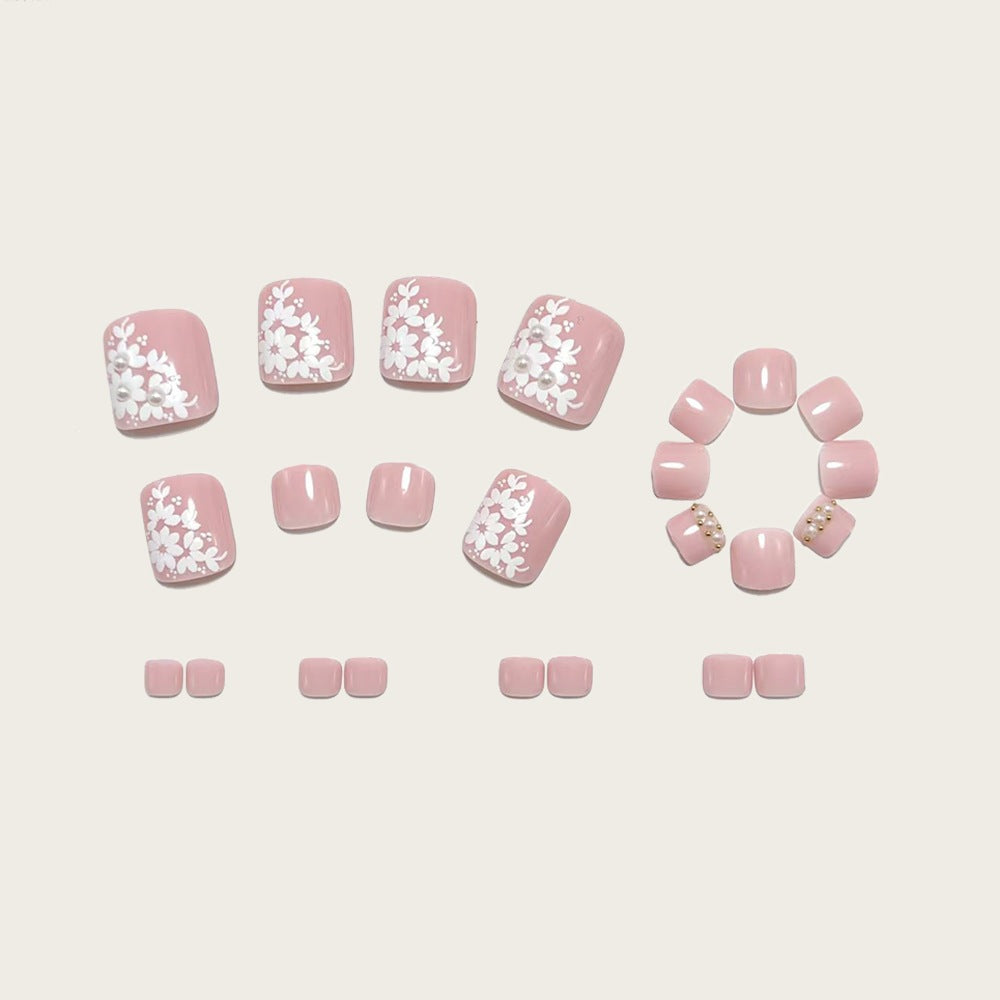 Artificial nails with delicate flower design and elegant accents Kalsten