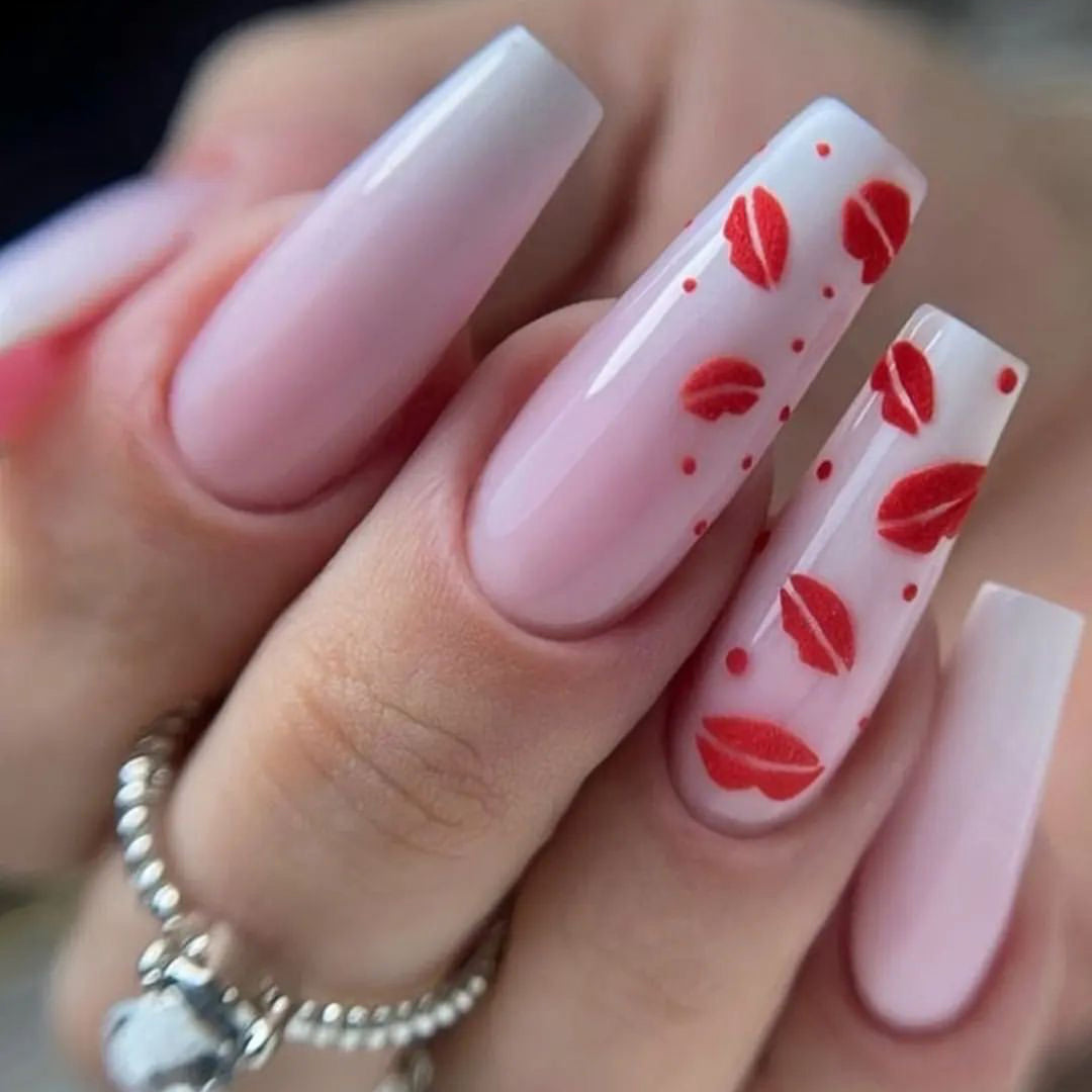 Artistic stiletto nails with lip motifs Kalsten