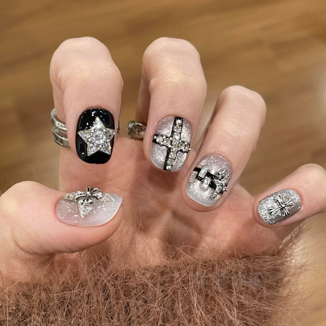 Glamorous artificial nails with rhinestone and glitter motifs Kalsten