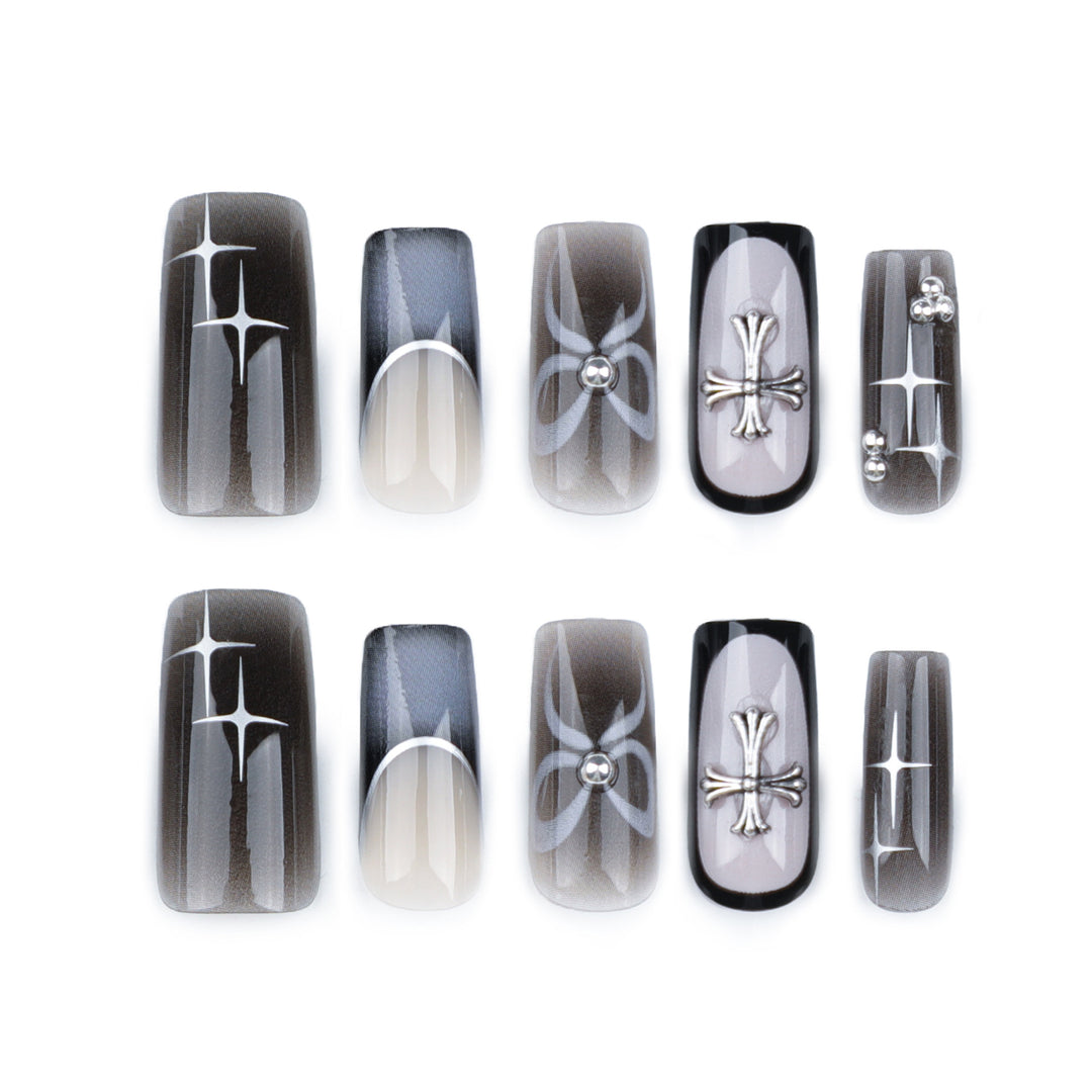 Artful acrylic nails with unique jewelry embellishments Kalsten