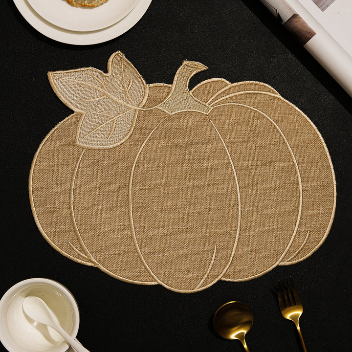 Pumpkin-shaped table set made of linen look with quilted contours and heat-resistant placemat