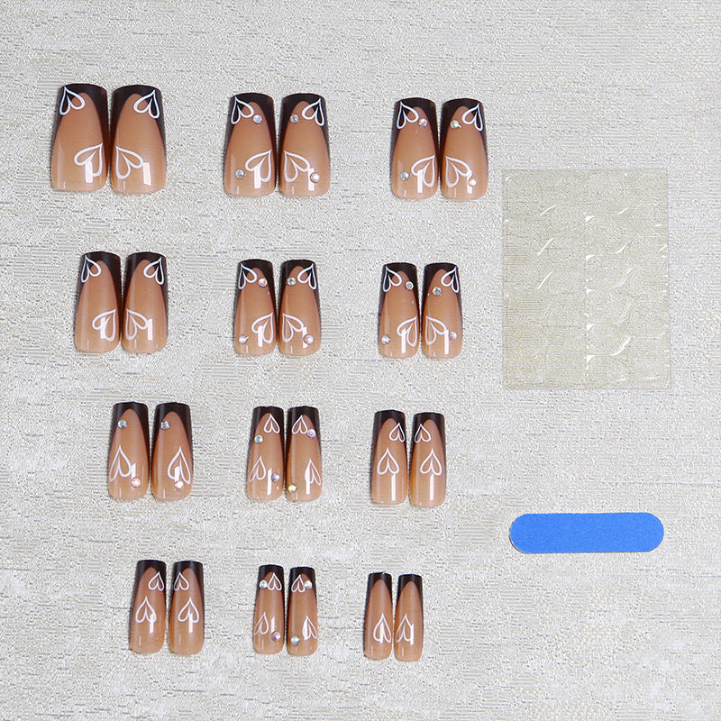 Elegant artificial nails with heart pattern and glitter accents Kalsten