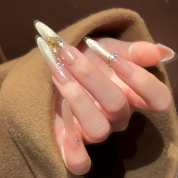 Artistic Stiletto Press-On Nail Art with Glimmering Accents Kalsten