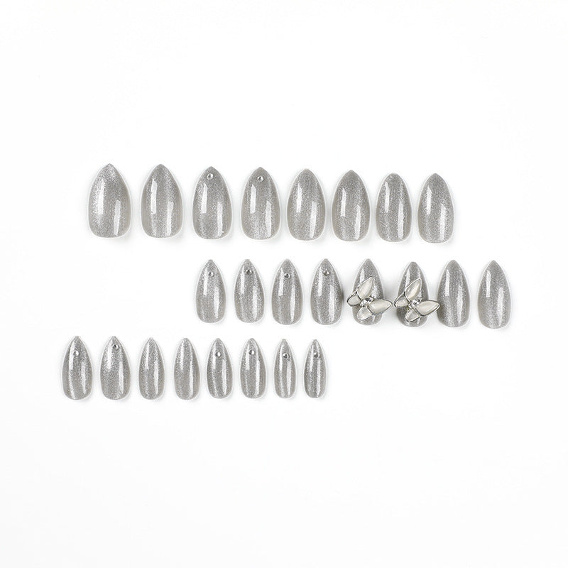 Glamorous stiletto nails with radiant glitter and elegant 3D design Kalsten