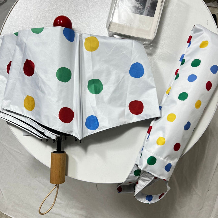 Ladies designer foldable umbrella with colorful polka dot pattern Kalsten