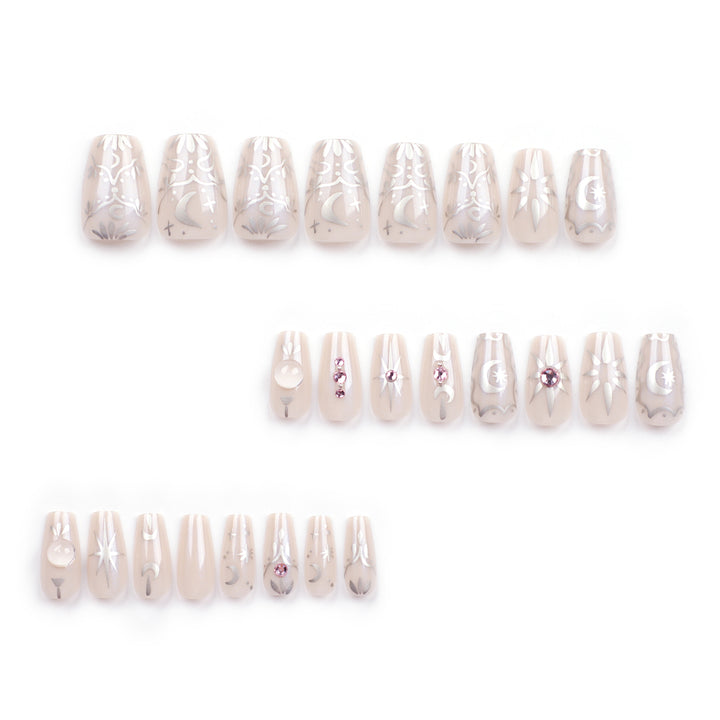 Artificial nail art with elegant rhinestone and glitter effects Kalsten