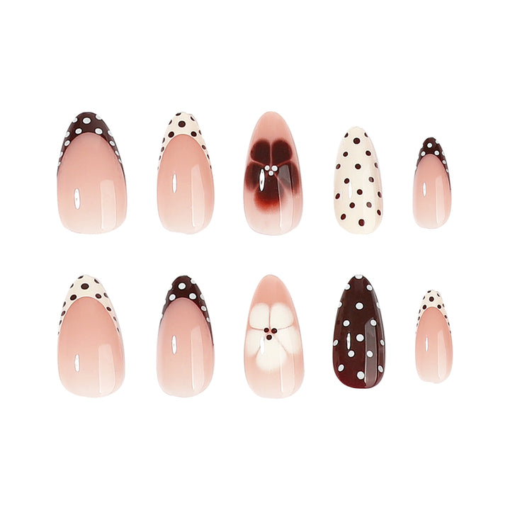 Artful nail art with floral design and various patterns Kalsten
