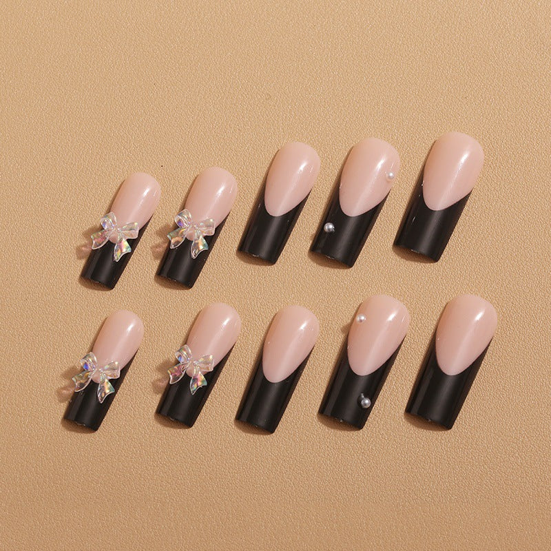 Nail decoration with elegant bows and rhinestones Kalsten