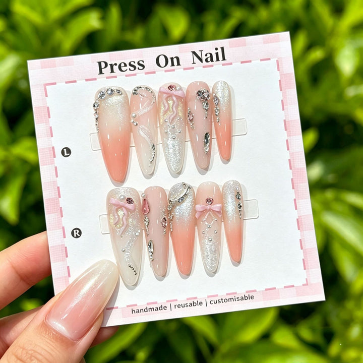 Artistic Press-On Nail Art Set with Cute Character and Bow Accents