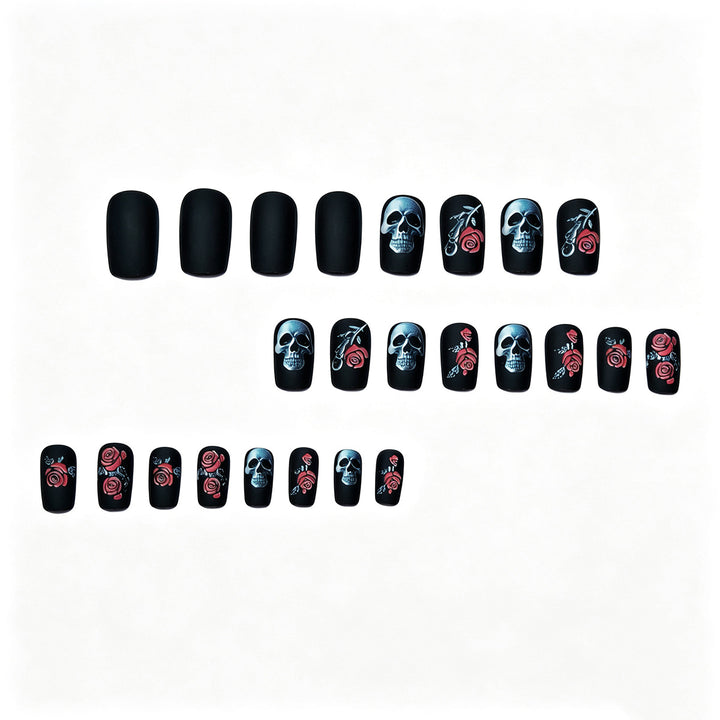 Creative nail art with skull and rose designs Kalsten