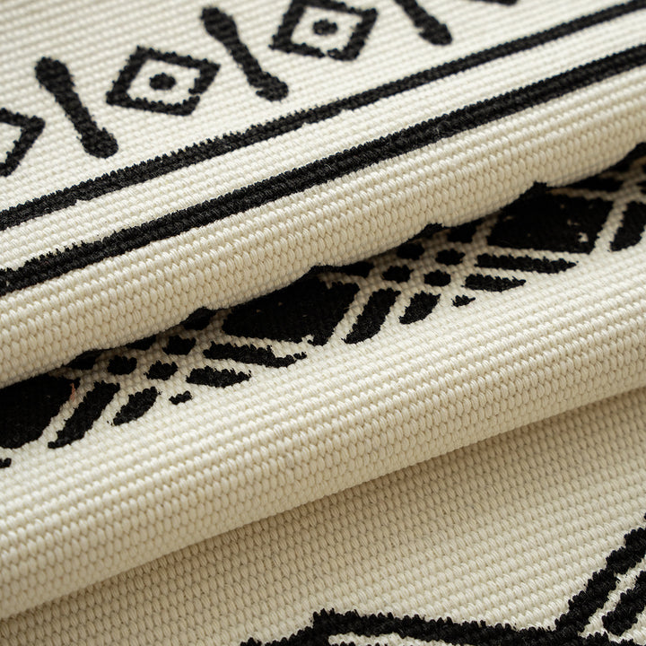 Boho table runner made of cotton blend with woven ethnic jacquard and decorative fringes Kalsten
