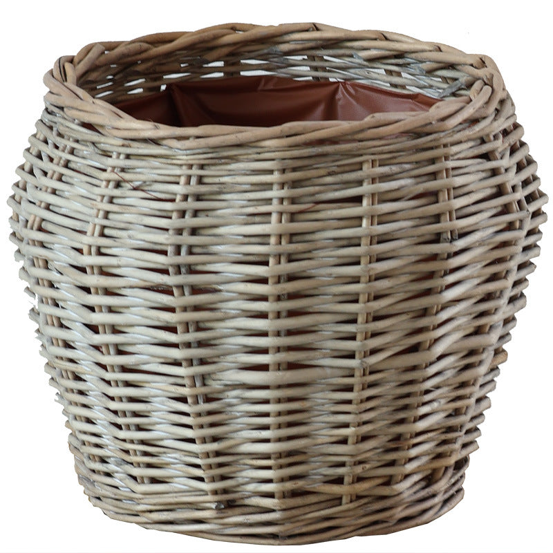 Stylish laundry basket made of braided natural material Kalsten