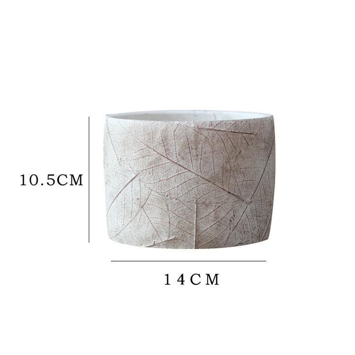Decorative plant container made of handmade ceramic with leaf pattern Kalsten