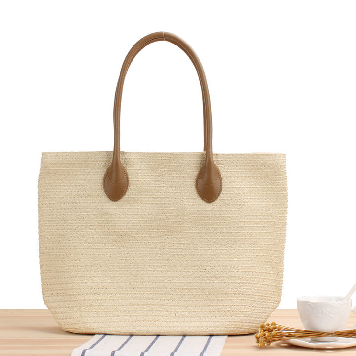 Spacious straw shopper with leather carrying handles Kalsten