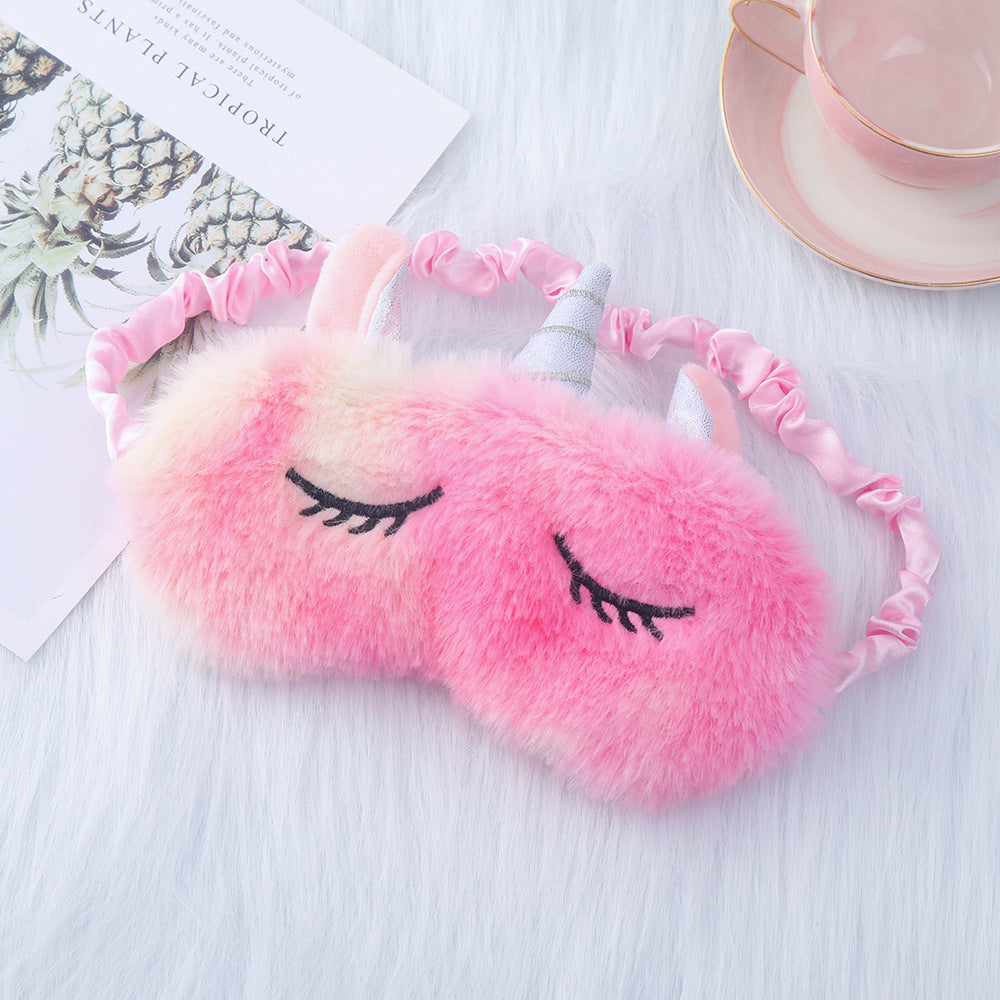 Women's plush-filled unicorn sleep mask with 3D horn, embroidered eyelashes and adjustable satin band Kalsten
