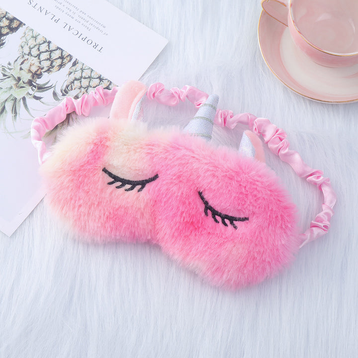 Women's plush-filled unicorn sleep mask with 3D horn, embroidered eyelashes and adjustable satin band Kalsten