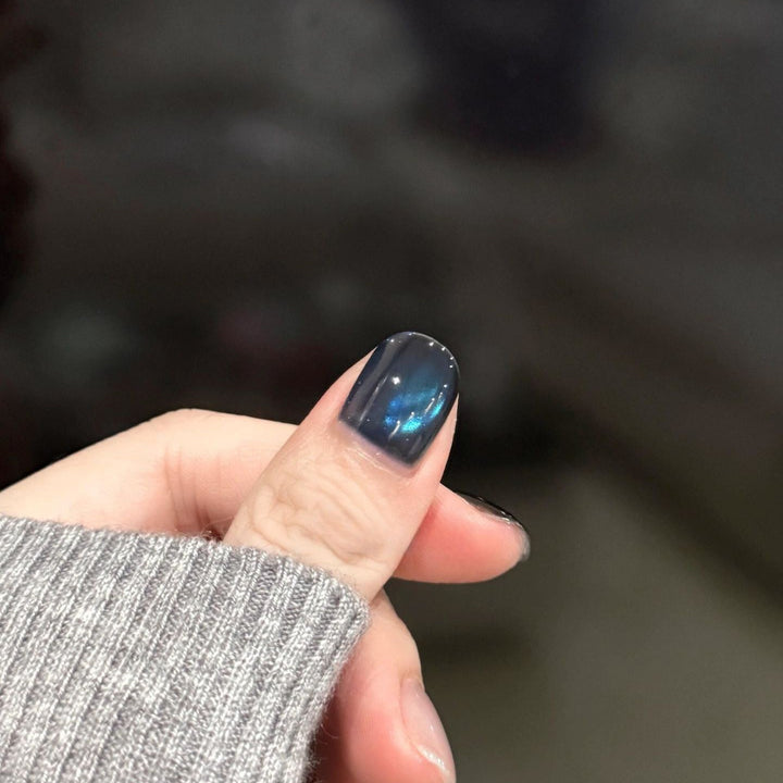 Artificial nails with elegant star design and shimmering effects Kalsten