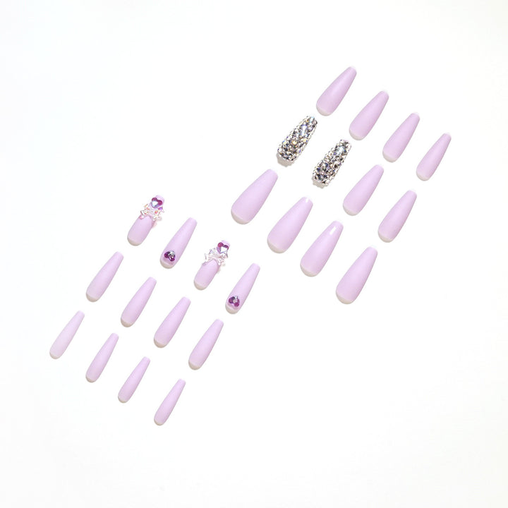 Artistic Stiletto Nails with Glitter and Flower Decorations Kalsten
