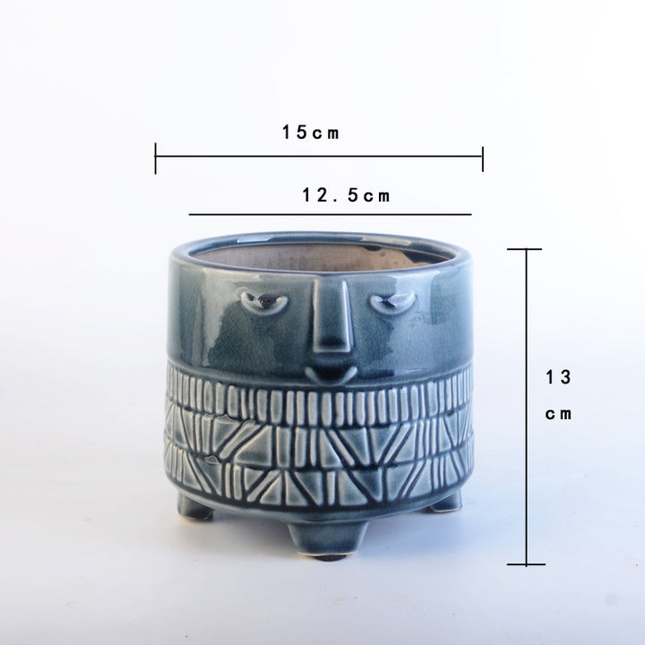 Decorative plant pot with facial features Kalsten