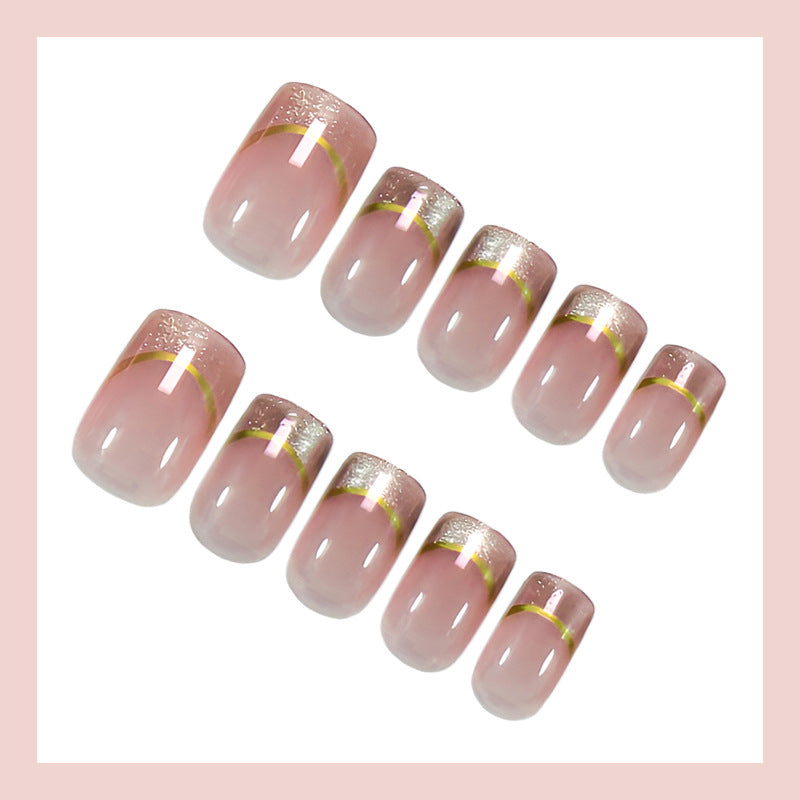 Artificial nail set with elegant glitter French tips and golden embellishments Kalsten