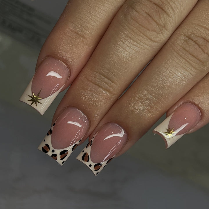 Creative nail art set with elegant leopard and glitter accents Kalsten