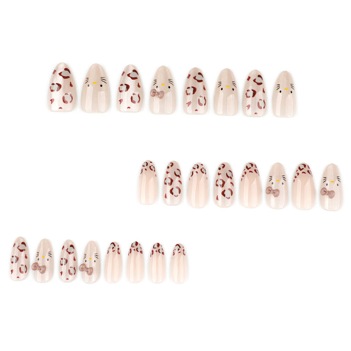 Creative Nail Art with Cute Cat Motif and Glitter Accents Kalsten