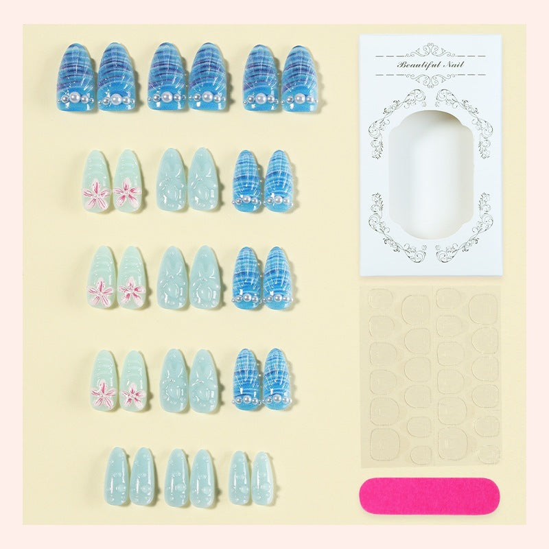 Nail art set with unique aquatic motifs and decorative accents Kalsten