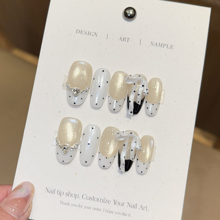 Artificial nails with glitter and bows Kalsten