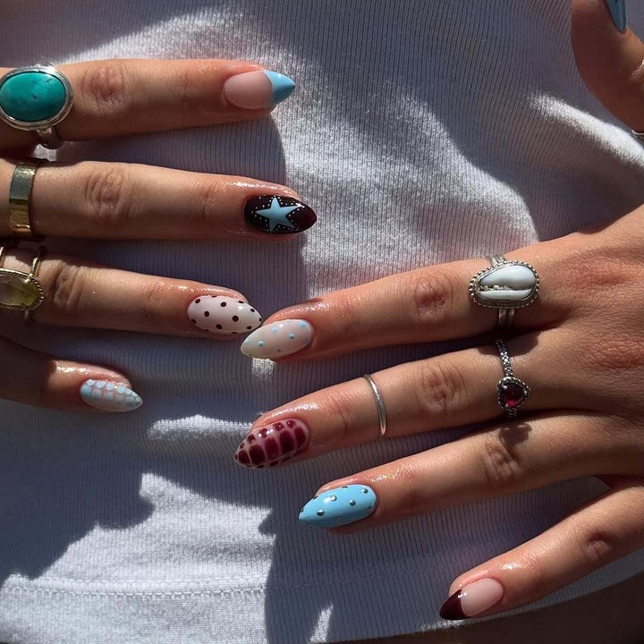 Artificial nail set with creative patterns and playful accents Kalsten