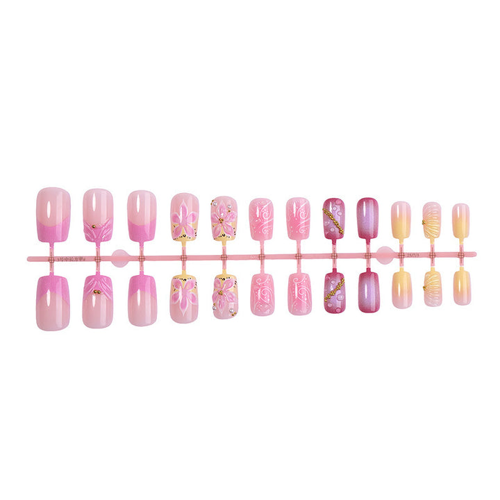 Artificial nail collection with floral design and glitter accents Kalsten