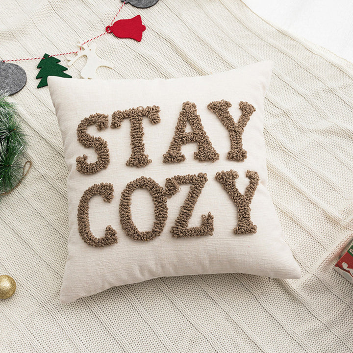 Decorative square cushion cover with hand-tufted lettering made of Bouclé Kalsten