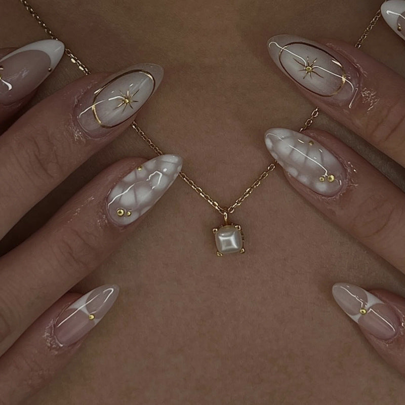 Elegant artificial nails with lustrous accents Kalsten
