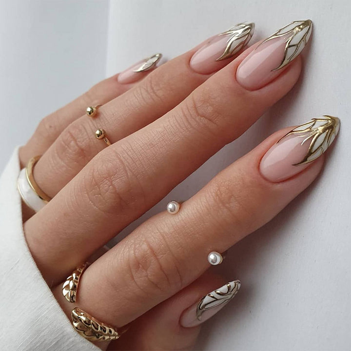 Artful stiletto nails with heart-shaped accents Kalsten
