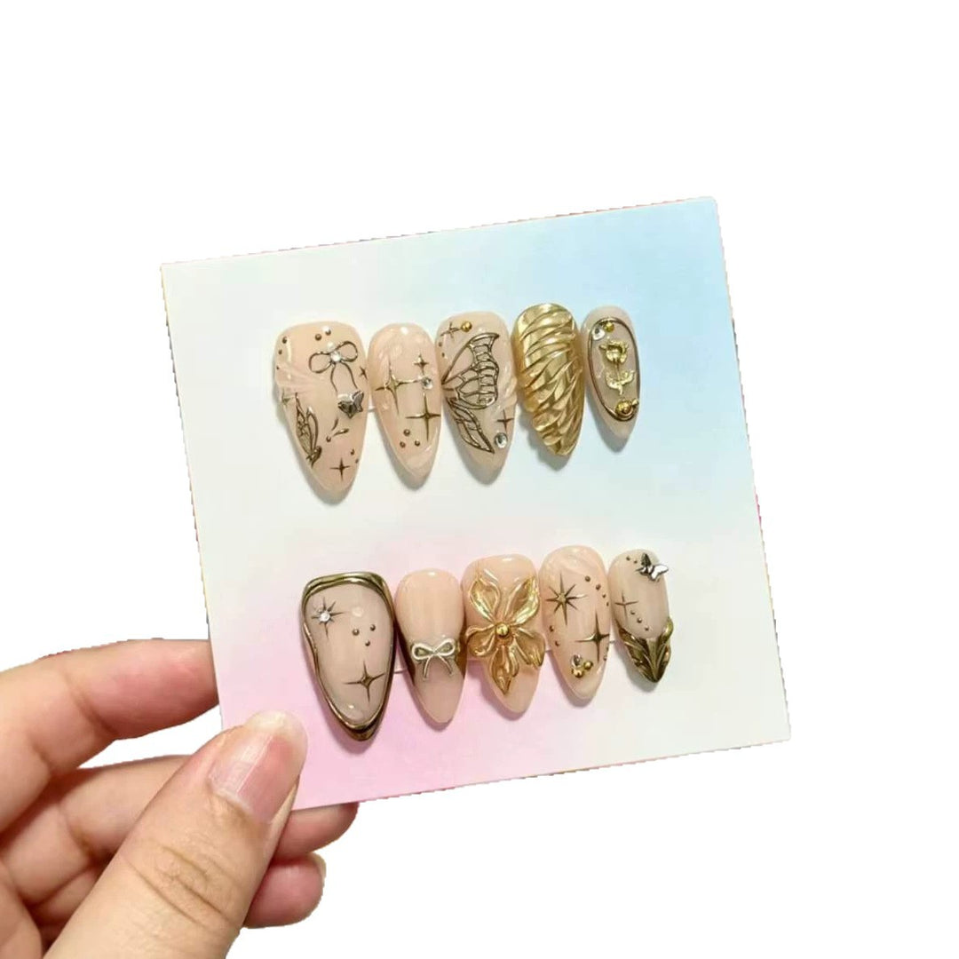 Artistic Press-On Nails Set with Gold and Floral Embellishments