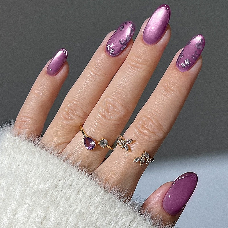 Elegant artificial nail set with shimmering accents and decorative designs Kalsten