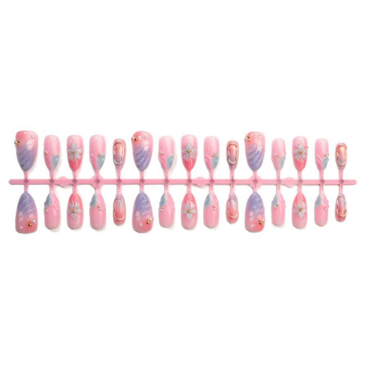 Artificial nails with flower pattern and glamorous accents Kalsten
