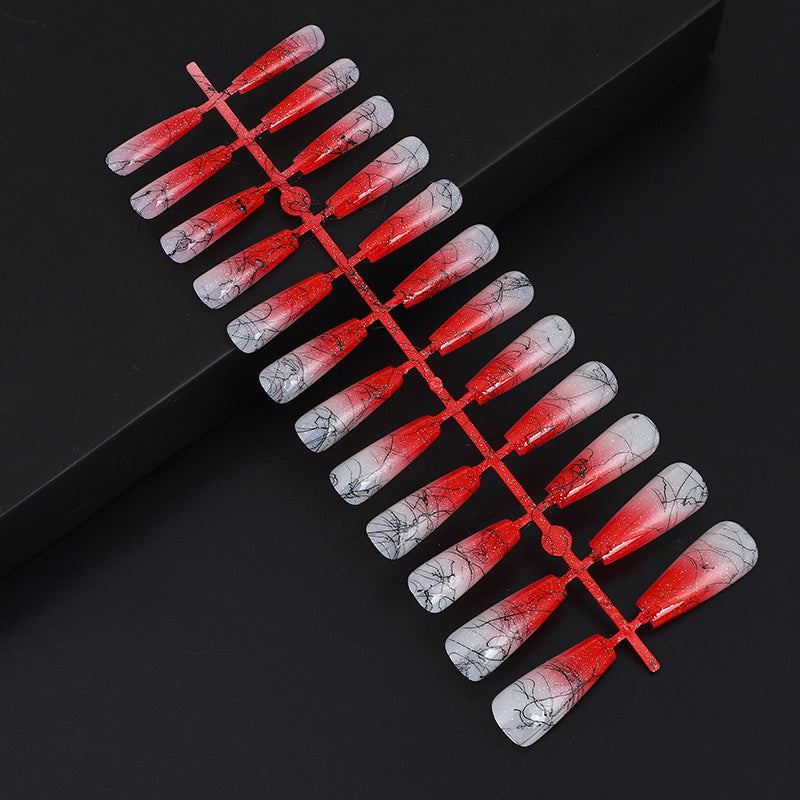 Artificial nails in modern ombre design with marbled accents Kalsten