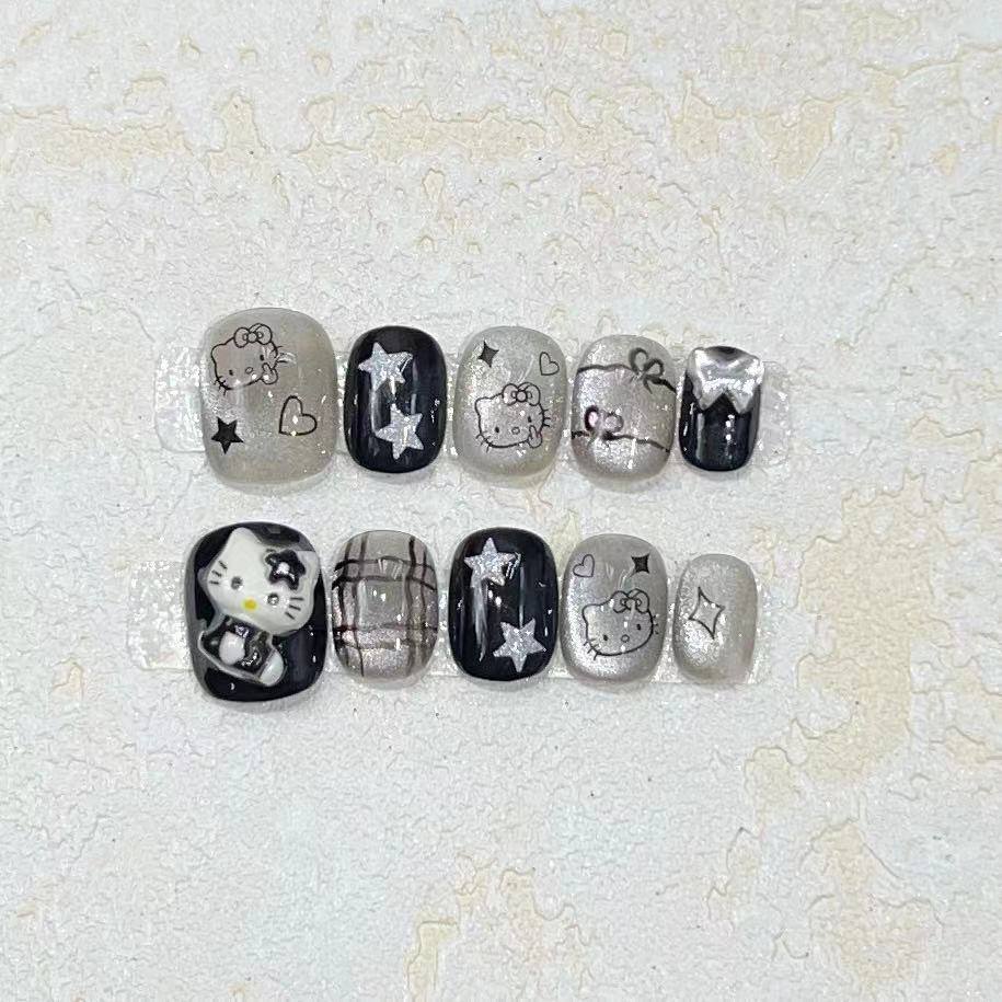Fun and Whimsical Press-On Nail Set with Cartoon Accents Kalsten