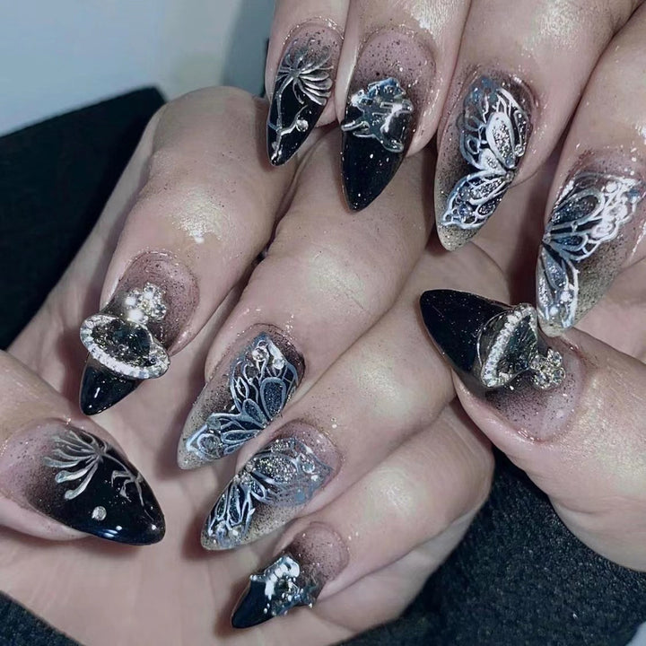 Artful stiletto nails with delicate embellishments and glamour accents Kalsten