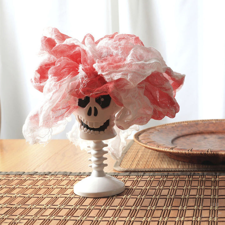 Creepy Halloween decor head with colorful cloth