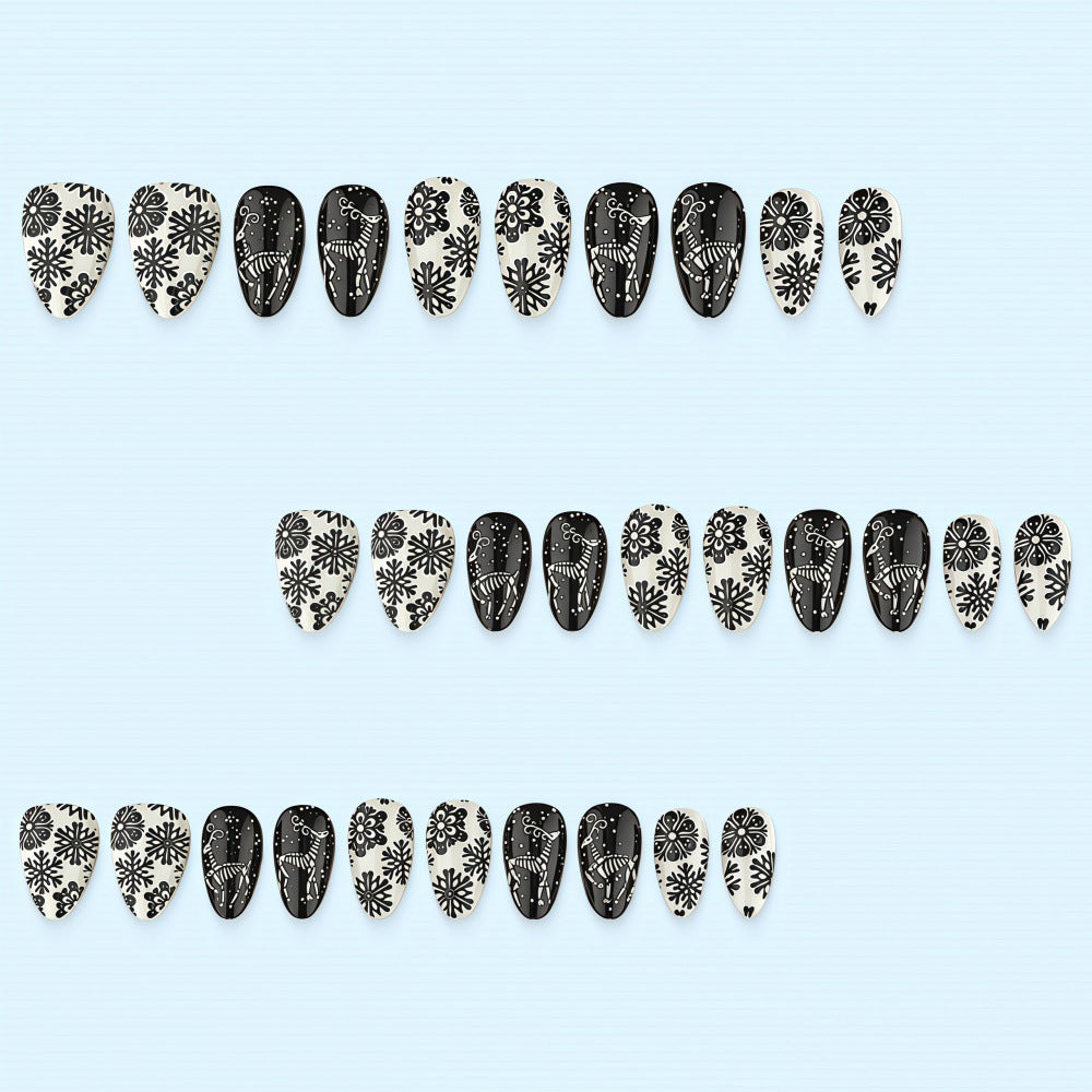 Artificial nails in a unique winter design with snow and reindeer motifs Kalsten