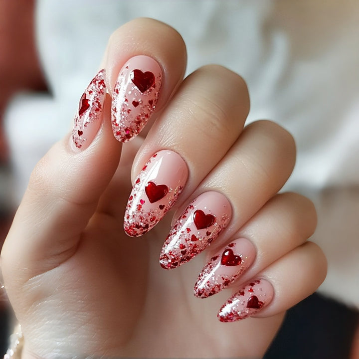 Glamorous artificial nails with heart design and glitter Kalsten