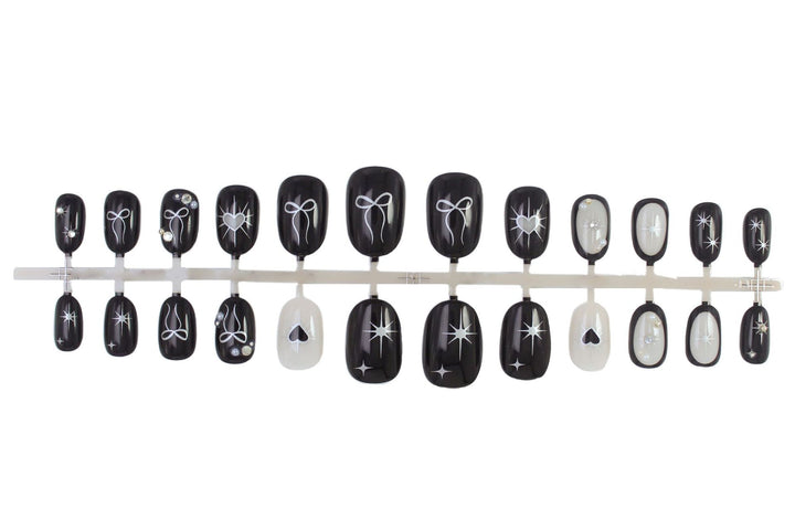 Artificial nail set with elegant bow and heart design Kalsten