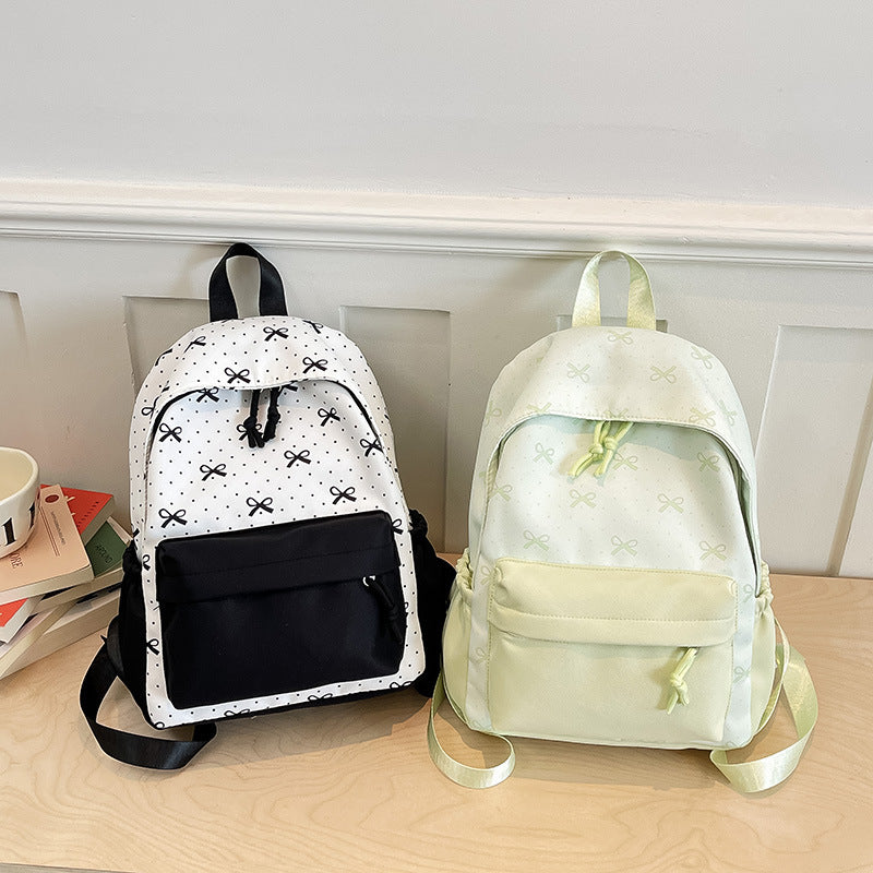 Cute everyday backpack with embroidered bows Kalsten