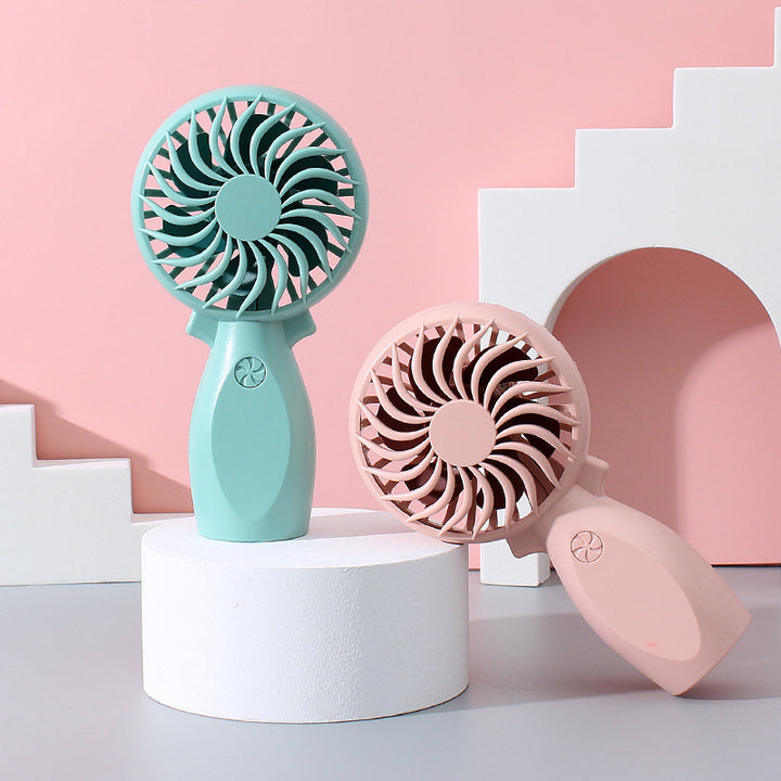 Women's portable hand fan with ergonomic grip and powerful battery technology Kalsten