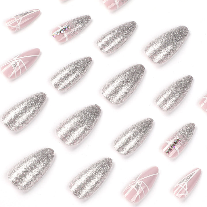 Artful nail extensions with glitter and geometric designs Kalsten