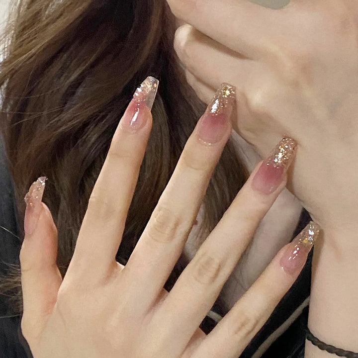 Artificial nails with glamorous glitter accents Kalsten