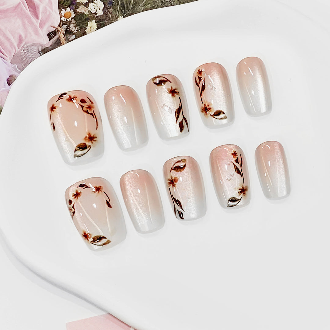 Artistic nail tips with floral accents Kalsten