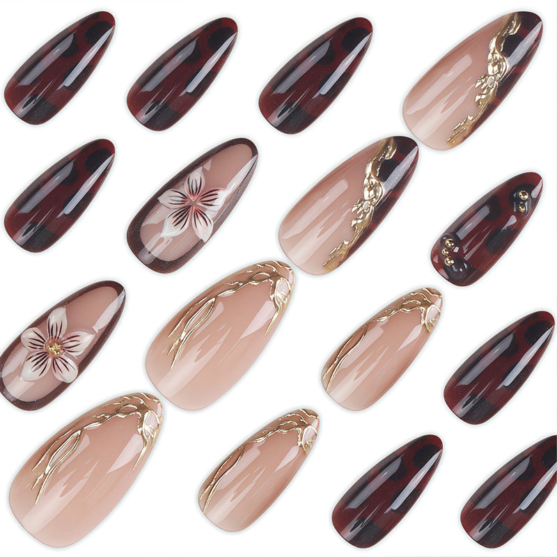 Decorative Stiletto Press-On Nails with Floral and Gold Accents Kalsten