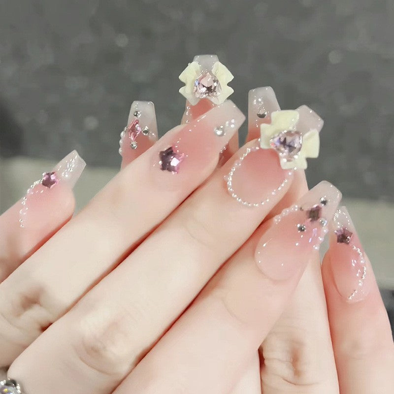 Glamorous artificial nails with moon and star motif Kalsten